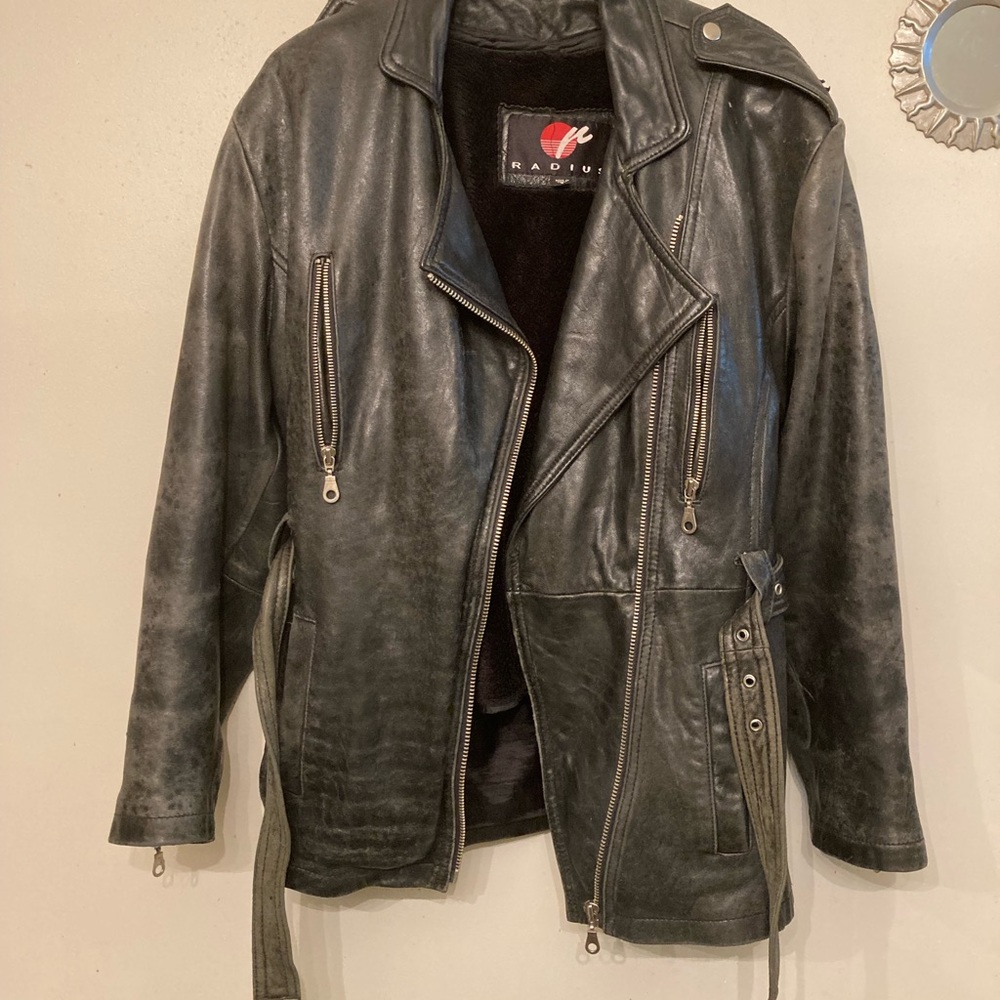 This leather jacket has a liner, it has that weathered look. Moving to warmer